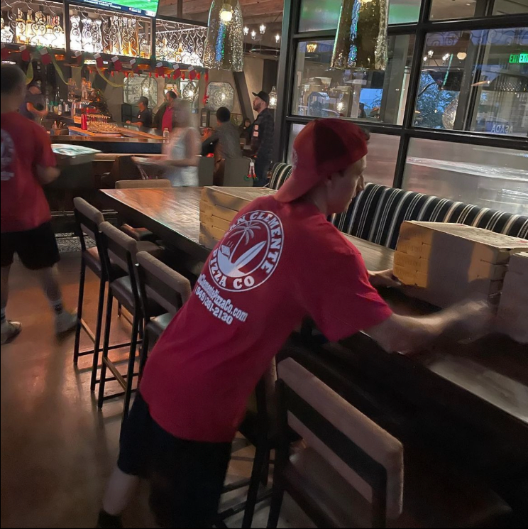 Our Team Delivering Pizza at a Fancy Event